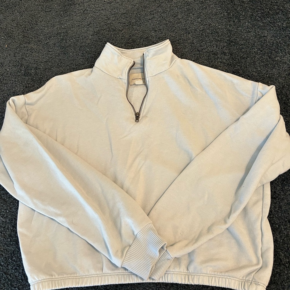 Good condition light blue zip top